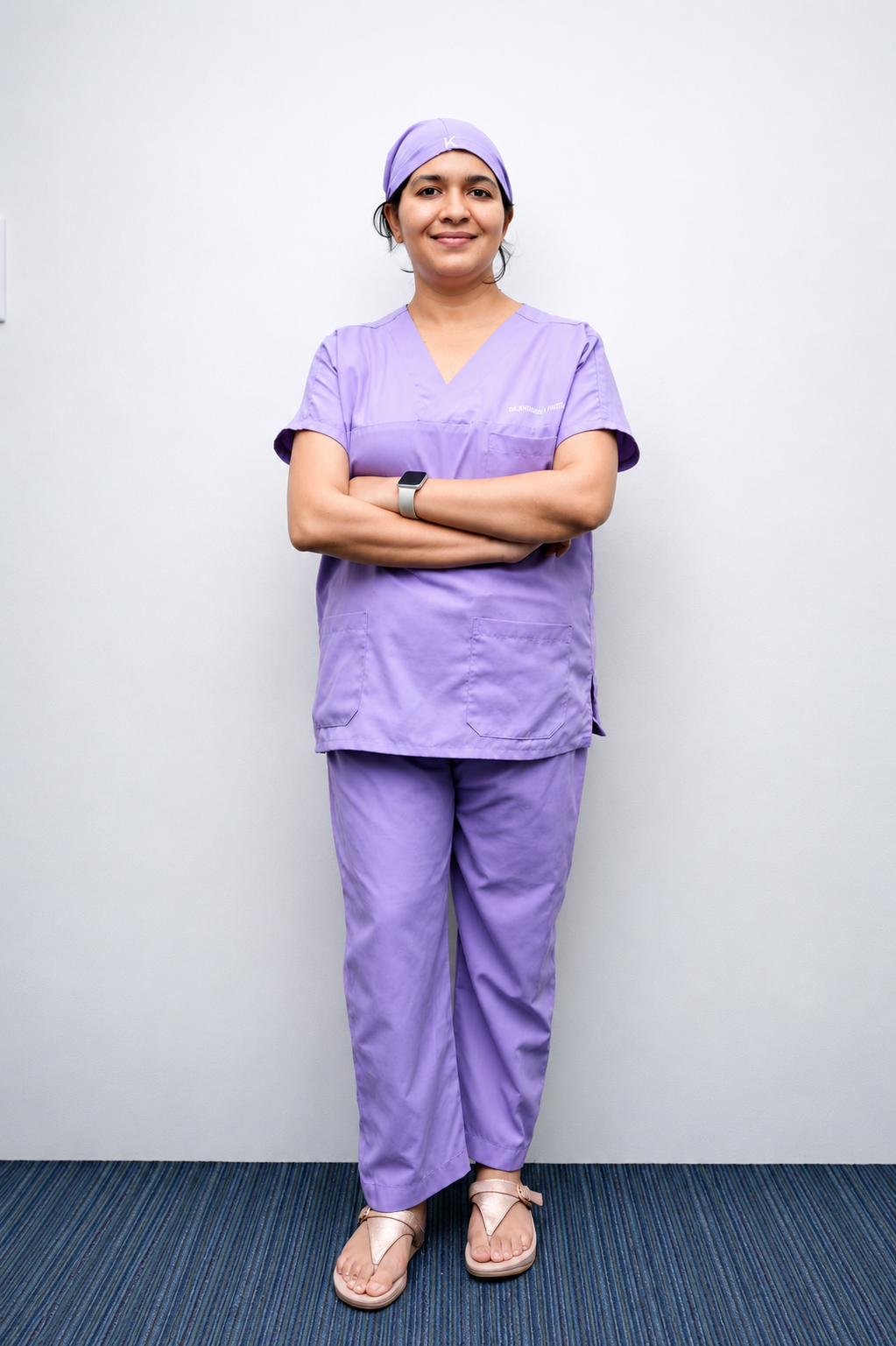 Dr. Khushbu Partani in clinical scrubs