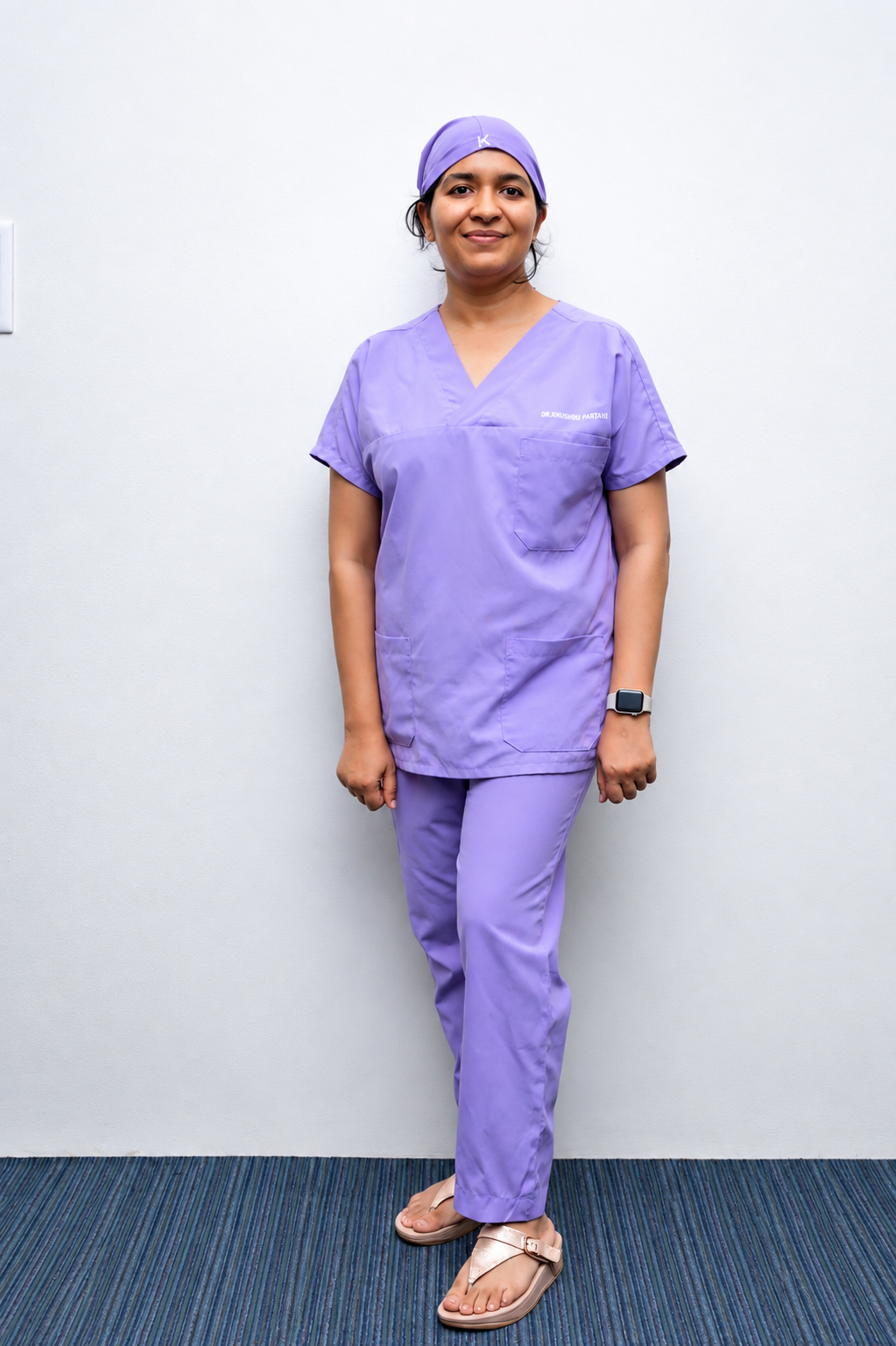 Dr. Khushbu Partani in clinical scrubs
